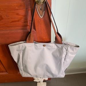 Nylon FRYE tote. Snap closure.